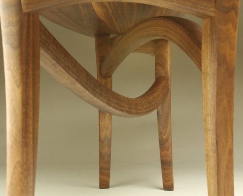 underside of custom helix bench, material: walnut harvested from the client’s property embellishments: steam-bent components
