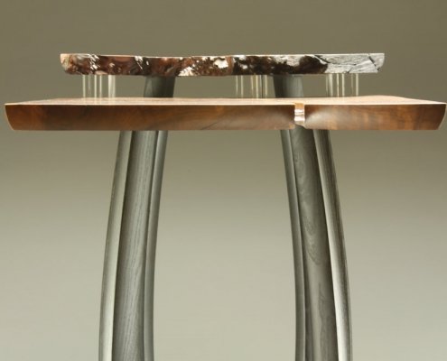 close up side view of table, is 29″ x 37″ x 16″ materials: redwood burl, reclaimed ebonized mulberry